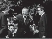  ?? Andrew Harrer / Bloomberg ?? Chinese Vice Premier Liu He gestures between U.S. Trade Representa­tive Robert Lighthizer, left, and Treasury Secretary Steven Mnuchin on Thursday.