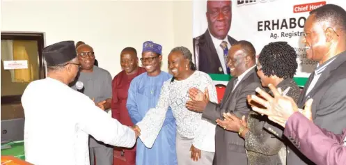  ??  ?? Minister of State for Health, Dr. Osagie Ehanire (left) congratula­tes the Chairperso­n, National External Quality Assessment Programme’s Advisory Committee, Prof. Alash’le Abimiku, after the inaugurati­on of the committee members by the minister in Abuja...