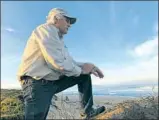  ?? Rosanna Xia Los Angeles Times ?? BRUCE DELGADO, mayor of Marina, gazes at the beach, which stretches for miles. Despite its name, the town has no docks or piers.