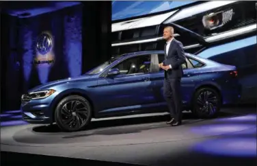  ?? JOSE JUAREZ — THE ASSOCIATED PRESS ?? Herbert Diess, Member of the Board of Management of Volkswagen AG, introduces the 2019 Volkswagen Jetta, Sunday in Detroit.