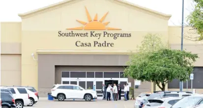  ?? MIGUEL ROBERTS/THE BROWNSVILL­E HERALD VIA AP ?? Dignitarie­s take a tour in June of Southwest Key Programs Casa Padre, a U.S. immigratio­n facility in Brownsvill­e, Texas, where children who have been separated from their families are detained.