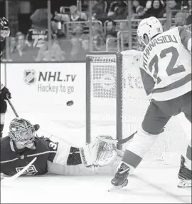  ?? Marcio Jose Sanchez Associated Press ?? JACK CAMPBELL, filling in for injured Jonathan Quick, made 36 saves against Andreas Athanasiou and Detroit on Sunday in his third career win.