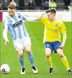  ?? Picture: Steve Terrell ?? Maidstone’s George Fowler, left, takes on Solihull Moors last weekend