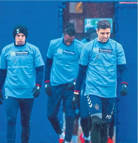  ?? Picture: SNS. ?? Rangers players during a training session yesterday.