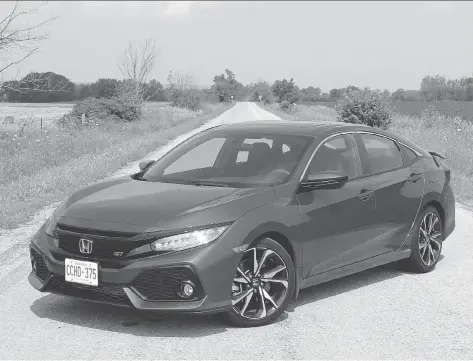  ?? PETER BLEAKNEY/DRIVING ?? The 2017 Honda Civic Si is available as either a four-door sedan or two-door coupe.