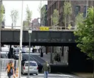  ?? JACQUELINE LARMA — THE ASSOCIATED PRESS ?? Work continues at the Rail Park on a recent Thursday in Philadelph­ia.