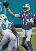  ?? WILFREDO LEE — THE ASSOCIATED PRESS ?? Buffalo Bills QB Josh Allen threw for 417 yards against the Miami Dolphins on Sunday in Miami Gardens, Fla.