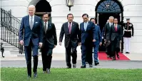  ?? AP ?? US President Joe Biden and Asean leaders arrive on the South Lawn of the White House for a group photo at the start of their ‘‘special summit’’.