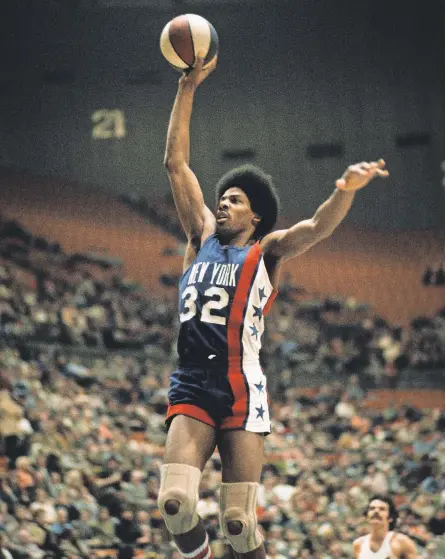  ?? MALCOLM EMMONS/ USA TODAY SPORTS ?? Julius Erving – Dr. J – was one of the stars of the ABA before it merged with the NBA.