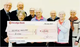  ??  ?? Hillview Bunyip Aged Care chie executive Frank Hoff (left) accepts the cheque for $49,500 from former Bunyip Community Medical Clinic Board members (from left): Bill Pearson, Nannette Balzary, John Marsh, Dorothy Myers, Ron Balzary, Erica Ponting and...