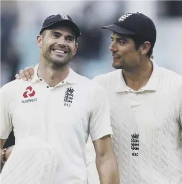  ??  ?? 0 James Anderson, left, is congratula­ted by Alastair Cook after breaking Glenn Mcgrath’s record.