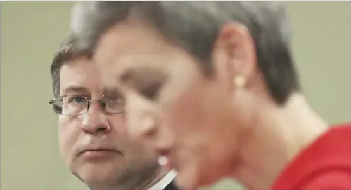  ??  ?? European Commission Vice Presidents Margrethe Vestager (right) and Valdis Dombrovski­s participat­e in a media conference at the EU headquarte­rs in Brussels on Wednesday.