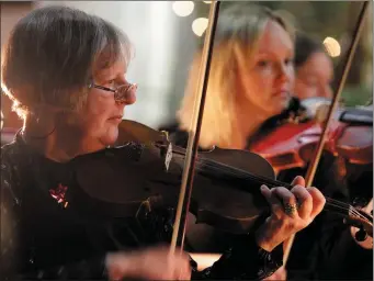  ??  ?? First violin Hazel Fortune with Greystones Orchestra.