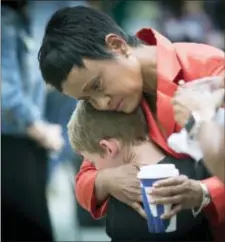  ?? ELIZABETH FLORES/STAR TRIBUNE VIA AP ?? Judge Glenda Hatchett was hugged by Philando Castile supporter Guthrie Morgan, 7, after Jeronimo Yanez was found not guilty on all counts in the shooting death of Philando Castile, Friday, in St. Paul, Minn.