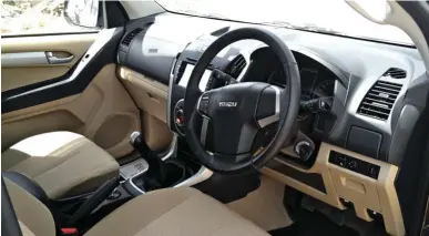  ??  ?? Duel-tone interior is ergonomica­lly well sorted, plush and comfortabl­e.