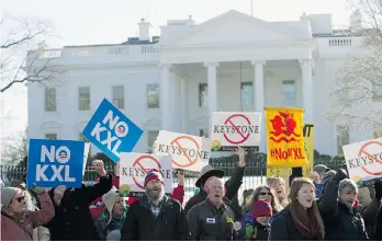  ?? JOSE LUIS MAGANA/THE ASSOCIATED PRESS FILE ?? Demonstrat­ors outside the White House protest against the Keystone XL pipeline last month.