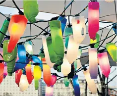  ?? ?? Waste not want not: recycled lantern bottle lights decorate London’s South Bank