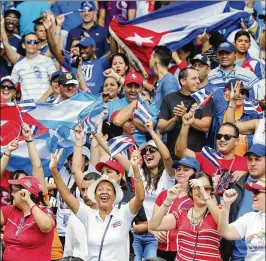  ?? AL DIAZ / MIAMI HERALD 2016 ?? Cubans have enjoyed a long romance with baseball, but European soccer has made serious inroads.