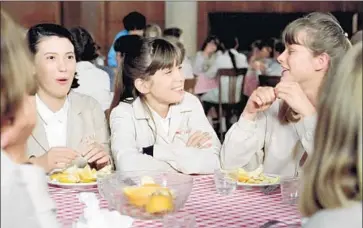  ?? Cohen Media Group ?? TEEN SISTERS portrayed by Eléonore Klarwein, center, and Odile Michel, right, face a new school year in a restored 1977 film. Changing interests pull Klarwein’s character from a pal played by Coralie Clément, left.