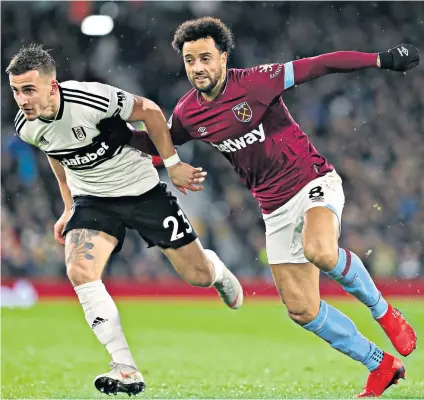  ??  ?? Growing influence: West Ham’s Felipe Anderson puts the pressure on Fulham defender Joe Bryan during another fine display