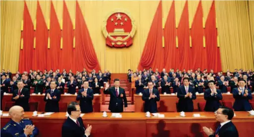  ??  ?? March 17, 2018: Xi Jinping is elected Chinese president and chairman of the Central Military Commission of the People’s Republic of China at the fifth plenary meeting of the first session of the 13th National People’s Congress (NPC) at the Great Hall...