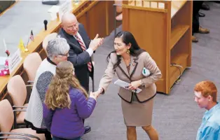  ?? LUIS SÁNCHEZ SATURNO/NEW MEXICAN FILE PHOTO ?? U.S. Rep. Deb Haaland, D-N.M., greets people after speaking at the Roundhouse last year.