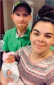  ?? Photo submitted ?? Shiane Barnes, her boyfriend Kyle Clark and their daughter Gypsy River get ready to head home from the hospital after Gypsy’s birth on March 14.