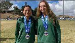  ?? COURTESY — HSU ATHLETICS ?? Humboldt State’s Rosa Granados, left, and Saedy Williamson placed in the top 15at the CCAA conference meet in San Marcos, earning them conference honors.