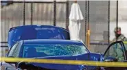  ?? AP PHOTO/CAROLYN KASTER ?? The car that crashed into a barrier on Capitol Hill is seen near the Senate side of the U.S. Capitol in Washington on Friday.