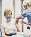  ??  ?? 0 Nicola Sturgeon receives her second vaccine dose