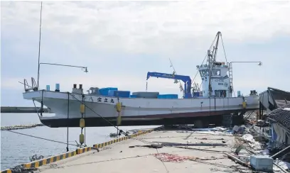  ?? Picture: EPA-EFE ?? A fishing boat washed away by the tsunami triggered by the New Year’s Day earthquake sits on the edge of a port in Suzu, Japan, yesterday. Almost a month after the devastatin­g earthquake, about 15 000 people are still evacuated.