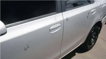  ??  ?? MORE than 50 Uber and Taxify drivers gathered at the KwaMashu police station on Tuesday. The drivers complained about intimidati­on by a group of men from a local taxi associatio­n and the lack of action from police. One of the vehicles, a Toyota Etios, above, was allegedly shot at by a group of men at Bridge City Shopping Centre last month. African News Agency (ANA)