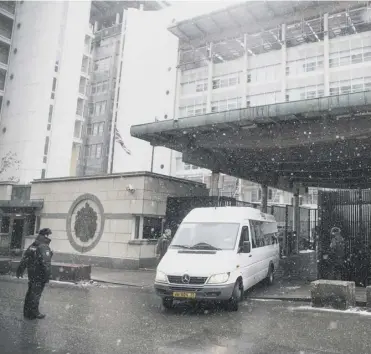  ?? PICTURE: PAVEL GOLOVKIN/AP ?? A minibus carrying diplmats leaves the UK embassy in Moscow