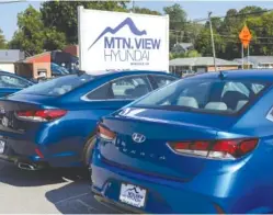  ?? STAFF PHOTO BY DOUG STRICKLAND ?? Hyundais are parked in the lot at the new Mountain View Hyundai on Wednesday.