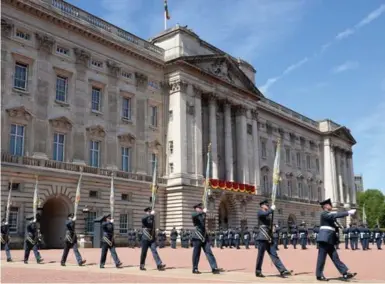  ?? ANTHONY DEVLIN/GETTY IMAGES ?? Buckingham Palace is in such poor condition that buckets have to be set out to catch water dripping from the roof in the gallery where the Queen’s priceless art collection is kept. A large chunk of masonry almost hit Princess Anne’s car in 2007.