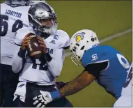  ?? JOHN LOCHER — THE ASSOCIATED PRESS ?? San Jose State defensive lineman Cade Hall sacks Nevada quarterbac­k Carson Strong during the second half in Las Vegas last week.