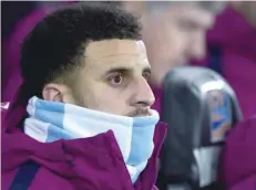  ?? — Reuters ?? Manchester City’s Kyle Walker looks on from the bench.