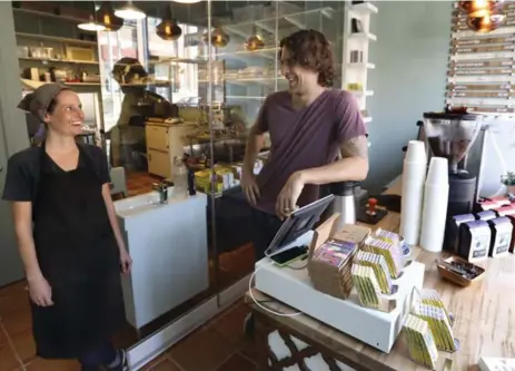  ?? RICHARD LAUTENS PHOTOS/TORONTO STAR ?? Owners and Katie and Kyle Wilson now make about 45 kilograms of chocolate per week. They also have 130 wholesale clients.