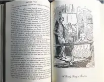  ?? LAURIE HERTZEL/MINNEAPOLI­S STAR TRIBUNE PHOTOS ?? This 1950 Modern Library edition of “Vanity Fair” contains Thackeray’s own wood engravings — and invites columnist Laurie Hertzel to revel in looking up terms common in mid-19th century England.