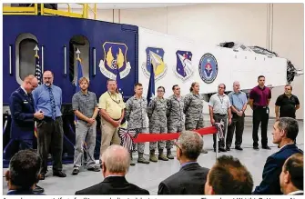  ?? TY GREENLEES / STAFF ?? A new human centrifuge facility was dedicated during a ceremony on Thursday at Wright-Patterson Air Force Base, just eight weeks before it will start testing the limits of thousands of military pilots over the next three decades for high-G combat maneuvers.