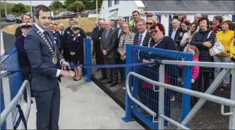  ??  ?? Councillor Keith Henry officially opens the new pontoon and walkway at the Lifeboat Station in Rosses Point.