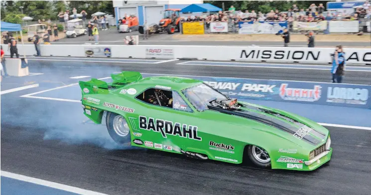  ?? PHOTOS: CAM HUTCHINS/DRIVING.CA ?? Based on the infamous Z28s of the late 1960s, this green funny car at the Mission Raceway was as beautiful as it was quick.