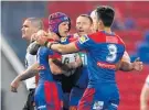  ?? Photo / Getty Images ?? Kalyn Ponga celebrates one of his two tries last night.