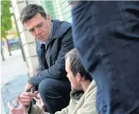  ??  ?? ●●Greater Manchester Mayor Andy Burnham touring the city centre on his first day looking at the homeless situation