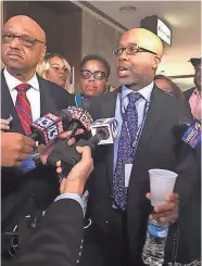  ?? COMMERCIAL APPEAL ?? Memphis City Councilman Martavius Jones speaks to reporters after he and council members Joe Brown, Jamita Swearengen and Patrice Robinson walked out of a City Council meeting on Dec. 4 over the District 1 City Council seat appointmen­t. JAMIE MUNKS / THE