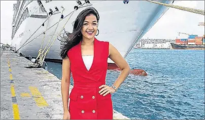  ?? SUBMITTED PHOTO ?? Quebec-born singer-songwriter Karine Ste-Marie stands in front of her ship, the MV Seabourne Odyssey, during a stop in Barbados.