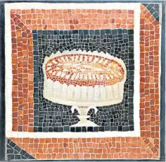 ?? ?? An almond cake in a second-century mosaic, found in a vineyard in Rome in 1823