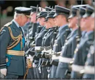  ?? (AFP) ?? Britain’s Prince Charles, Prince of Wales (left), in his role as Marshal of the Royal Air Force (RAF), attends a graduation parade at RAF Cranwell, near Sleaford, eastern England, recently.