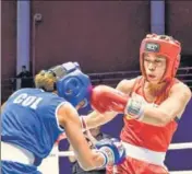  ?? PTI ?? Mary Kom (L) (51kg) beat Colombian Valencia Victoria on Thursday to advance to the Women's World Championsh­ip semi-finals.