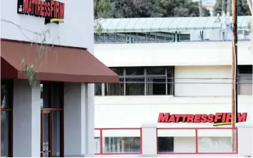  ?? News Agency (ANA) MIKE BLAKE African ?? TWO MATTRESS Firm stores, a brand owned by Steinhoff, lie on either side of the street in Encinitas, California, US. |